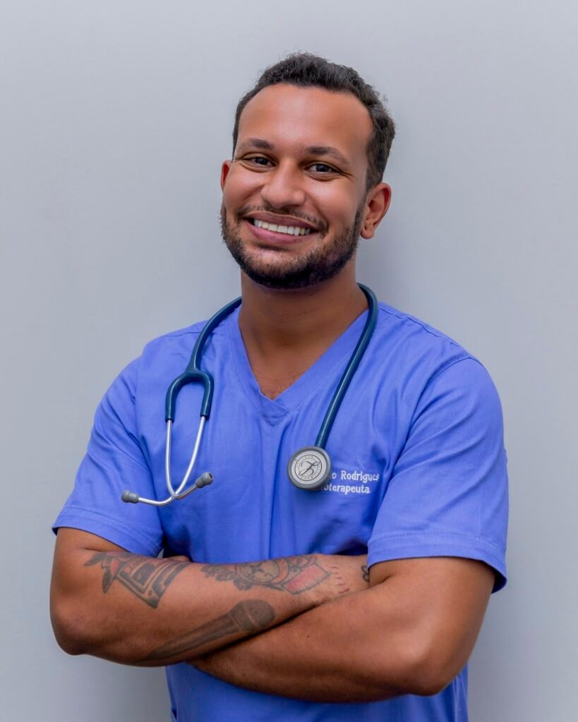 A smiling health worker with a stethoscope