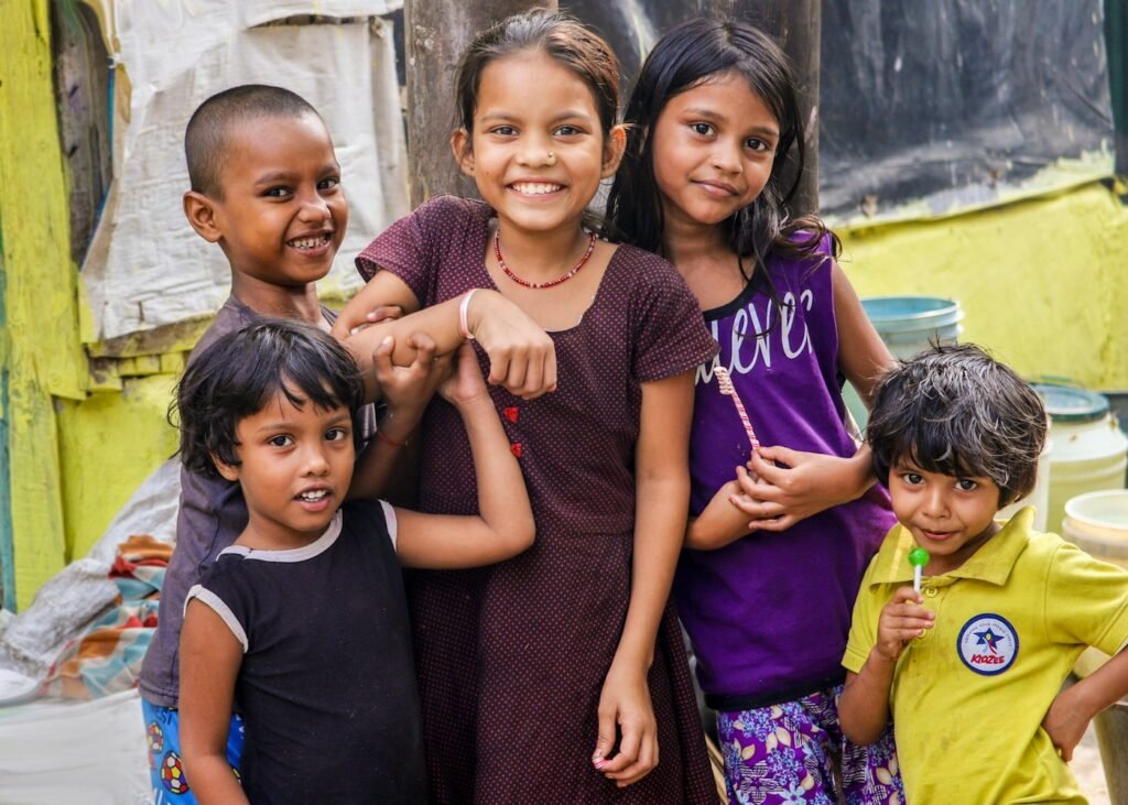 Five children smiling together