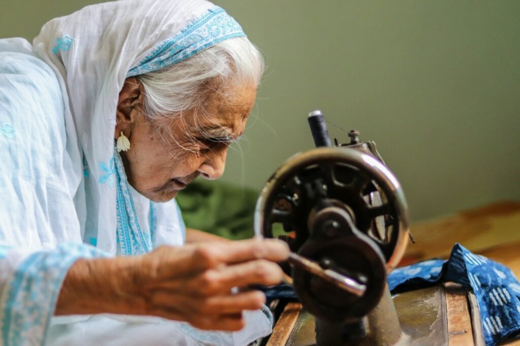 Hands at work on a sewing machine
